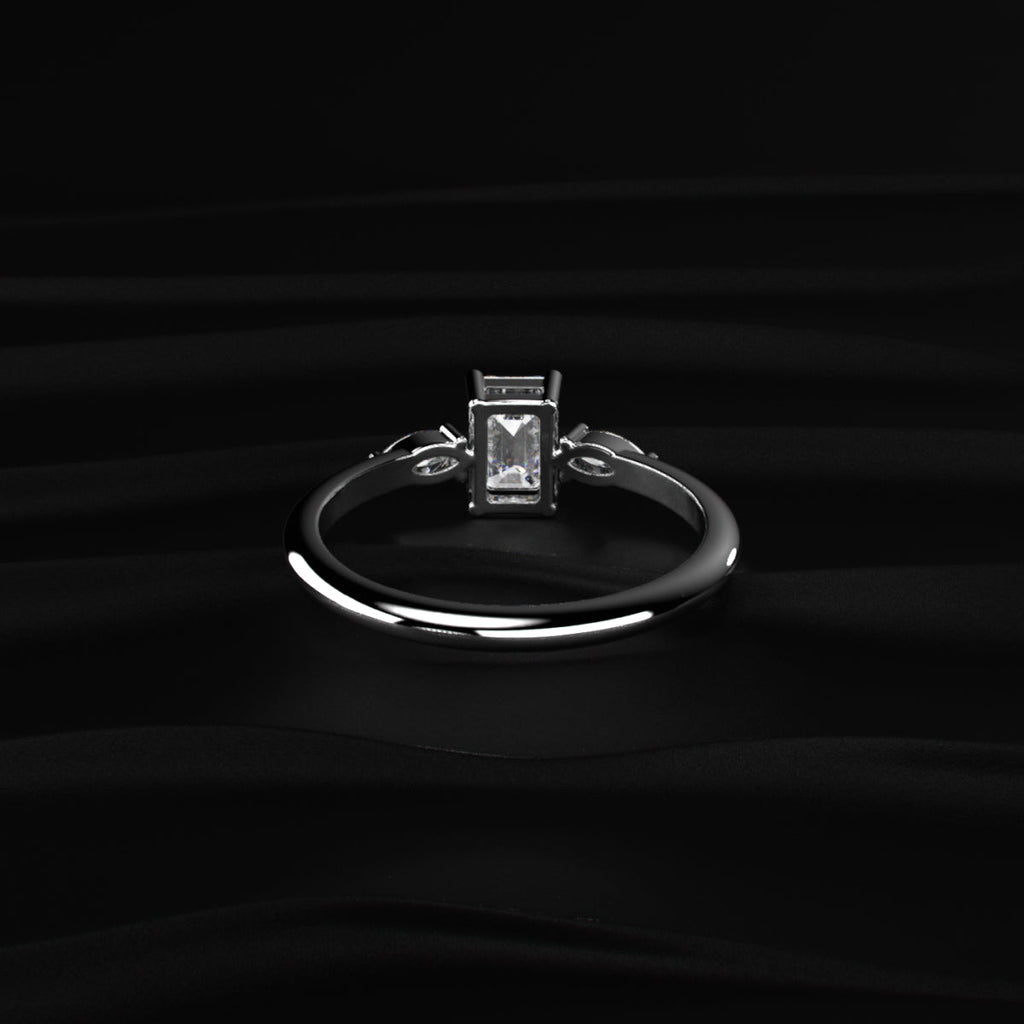 Emerald Cut with Marquise Side Diamonds Ring