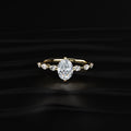 Oval Diamond Ring With Marquise Side Stones