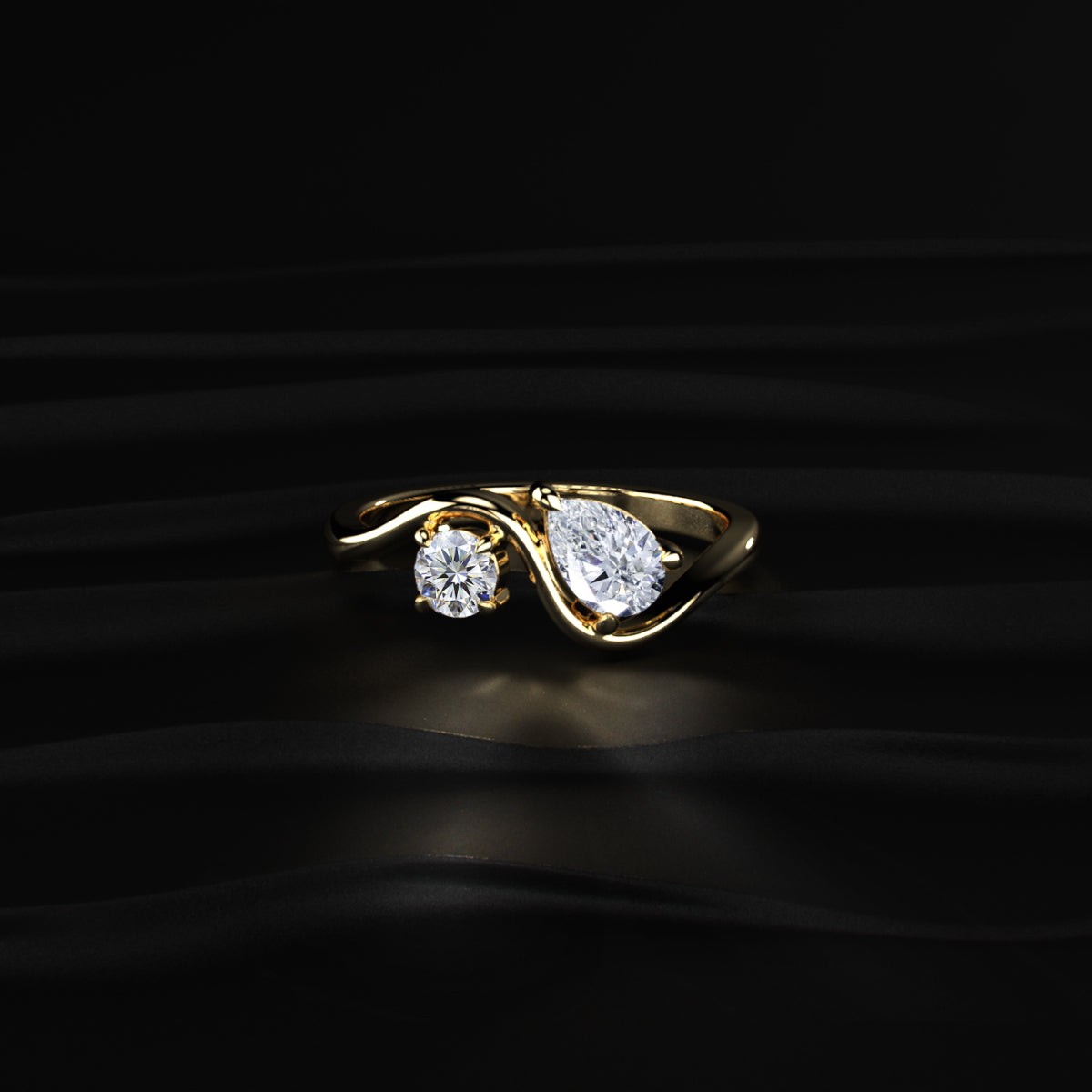 Round And Pear Diamond Toi Et Moi Ring