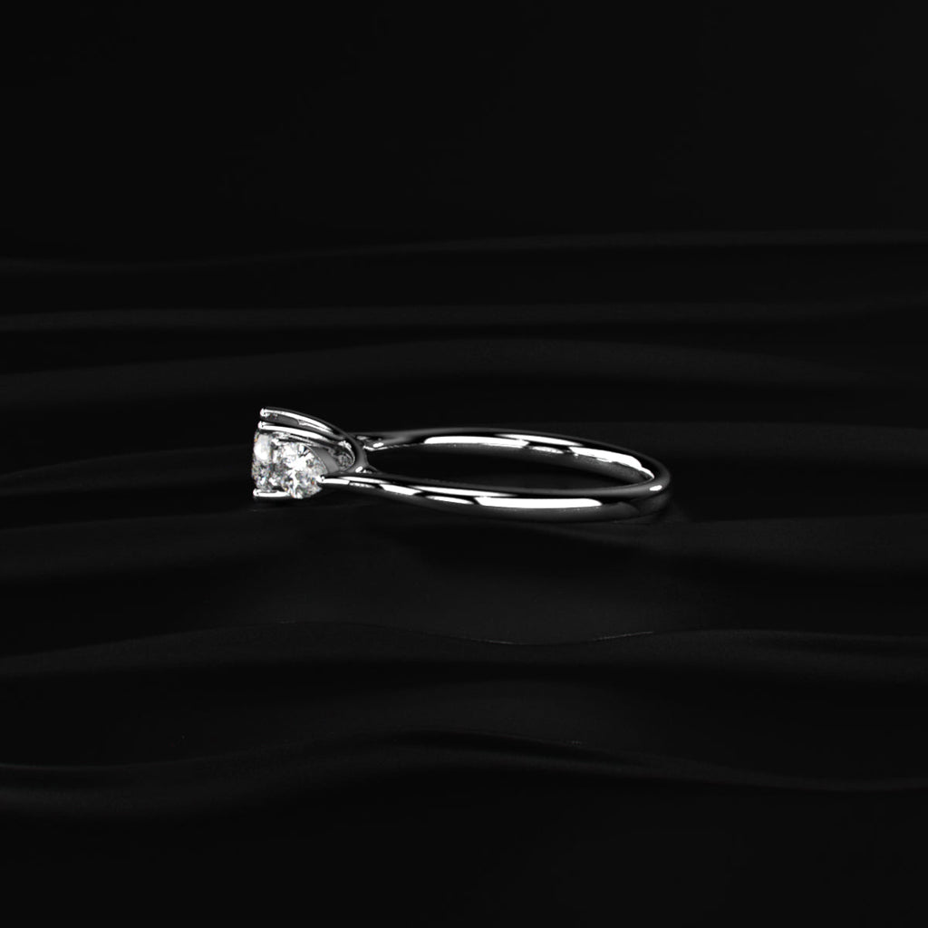 Round Diamond Ring With Pear Side Stones