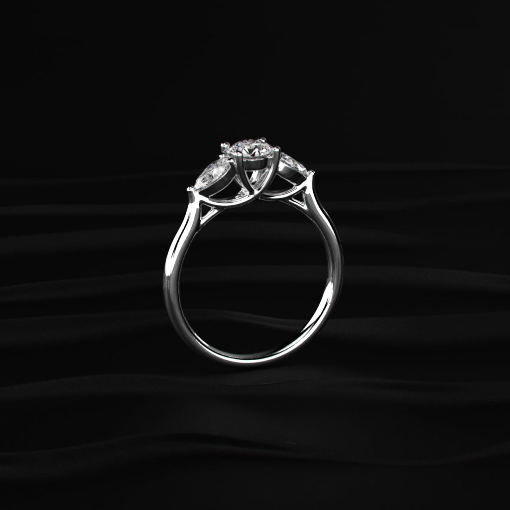 Round Diamond Ring With Pear Side Stones