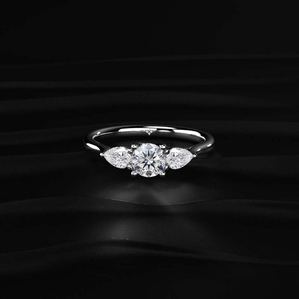 Round Diamond Ring With Pear Side Stones