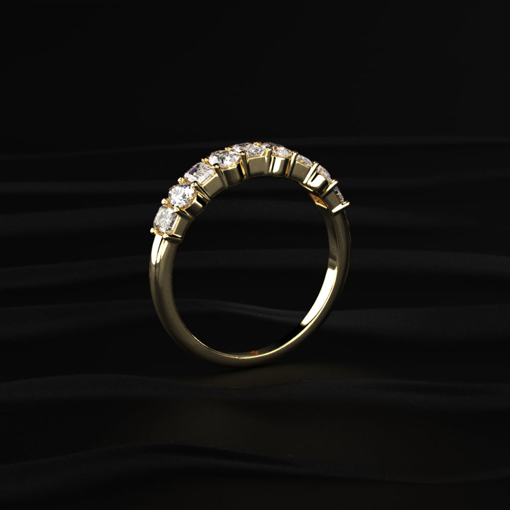 Pear And Emerald Cut Half Eternity Ring