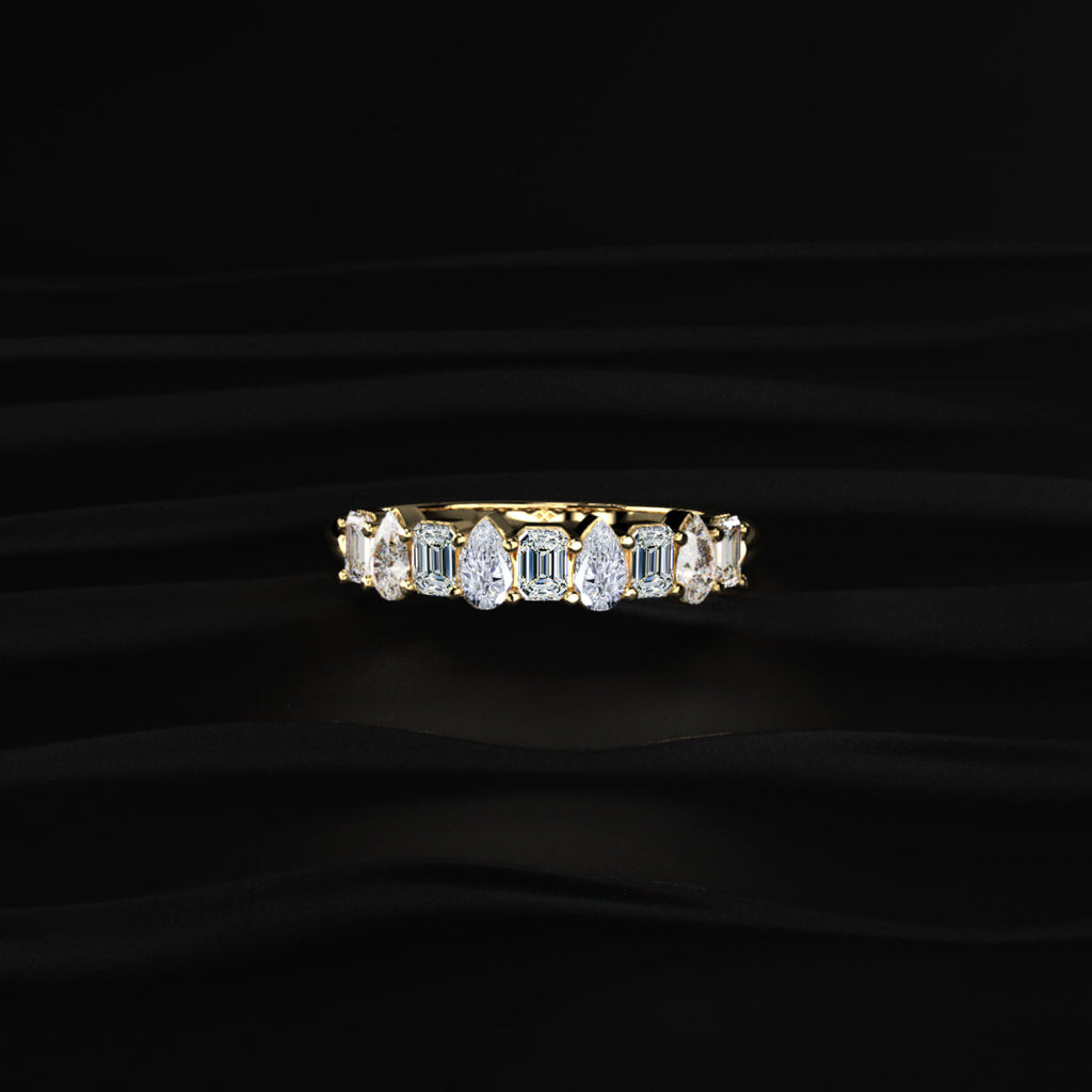 Pear And Emerald Cut Half Eternity Ring