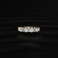 Pear And Emerald Cut Half Eternity Ring