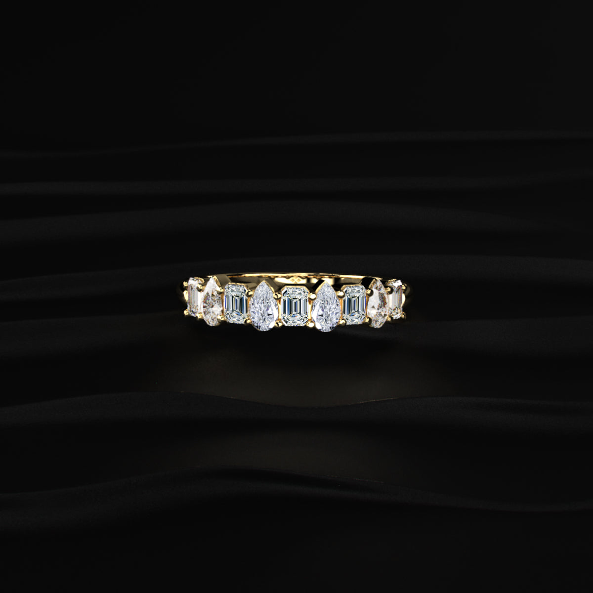 Pear And Emerald Cut Half Eternity Ring