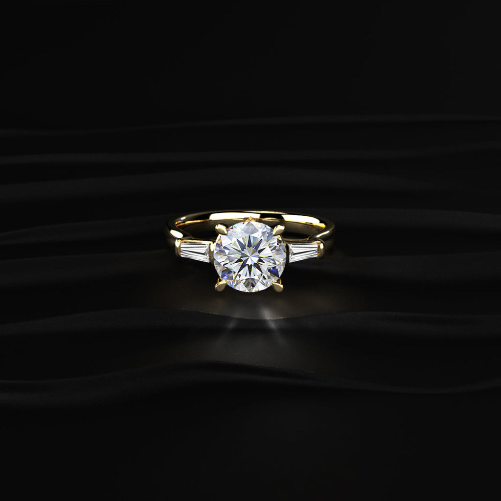 Round Solitaire Engagement Ring With Tapered Baguette