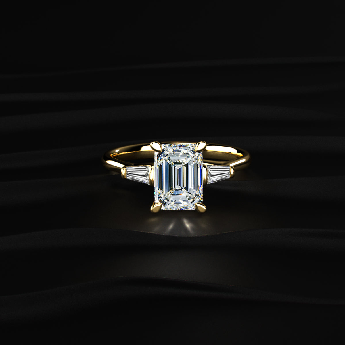 Emerald Solitaire Engagement Ring With Tapered Baguette