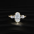 Oval Half Bezel Solitaire Ring With Side Stones