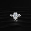 Oval Half Bezel Triple Diamond Engagement Ring