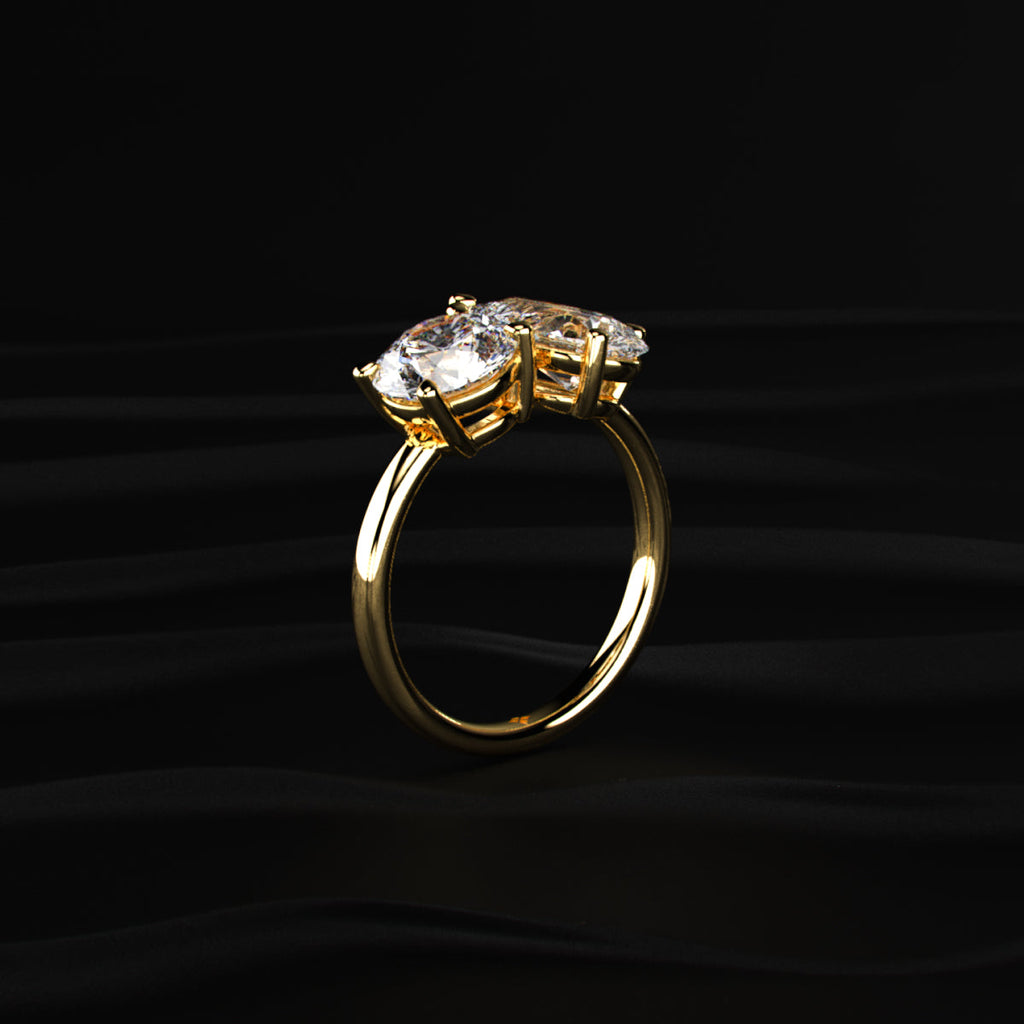Round And Pear Toi Et Moi Engagement Ring
