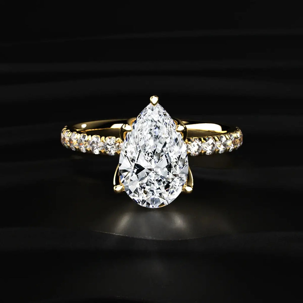 Pear Solitaire Ring With Pave Floral Prong