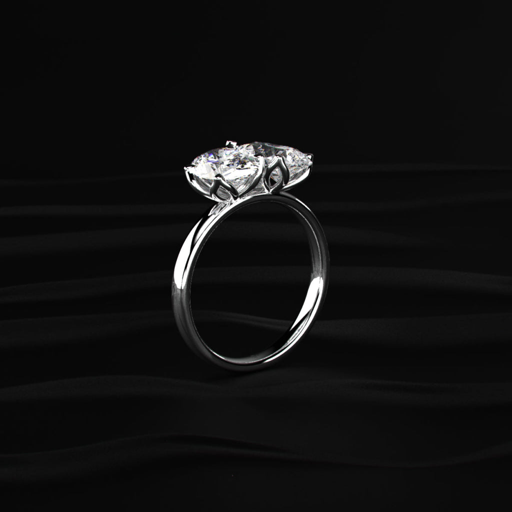 Oval And Pear Solitaire Floral Toi Et Moi Ring