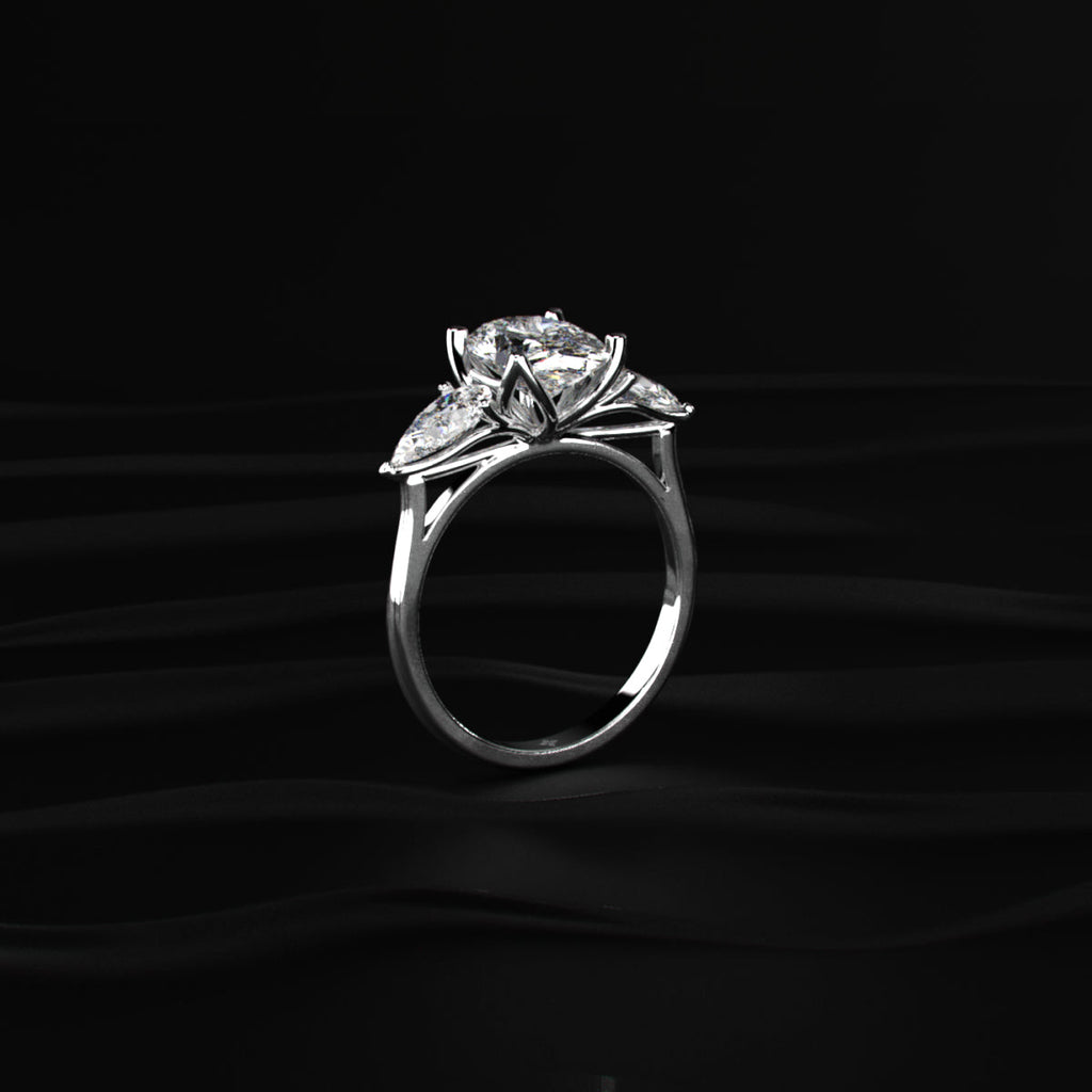 Oval Diamond Triology Ring In Floral Setting With Side Pear