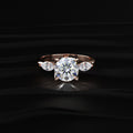 Round Floral Solitaire Ring With Side Marquise Stone