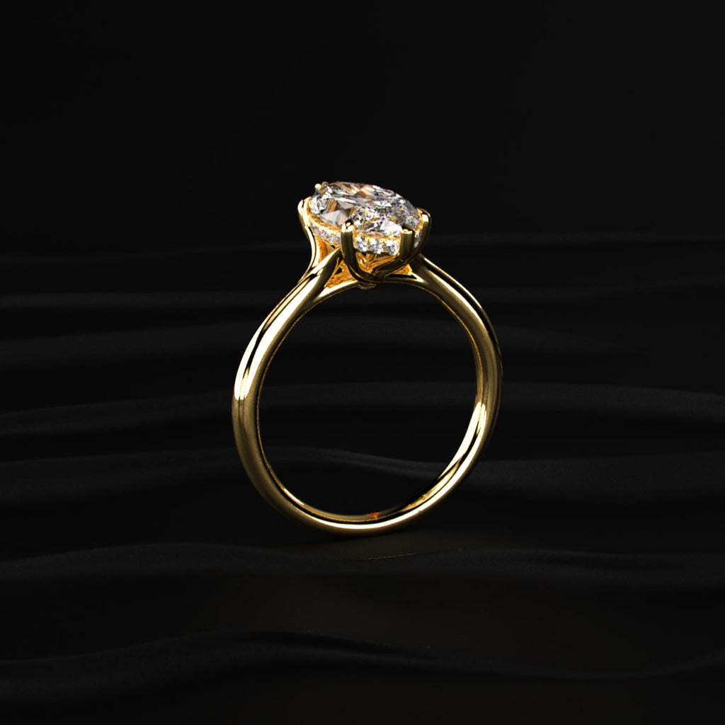 Marquise Solitaire Ring With Hidden Halo