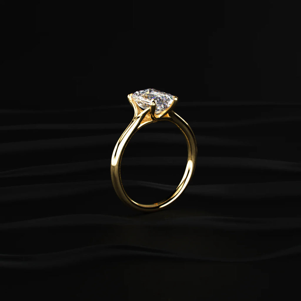 Emerald Solitaire Split Shank Engagement Ring