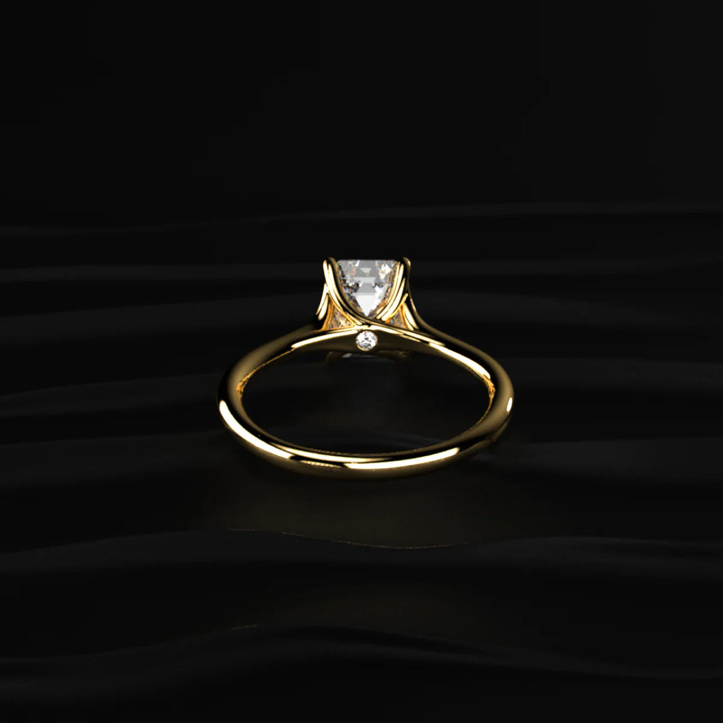 Emerald Solitaire Split Shank Engagement Ring