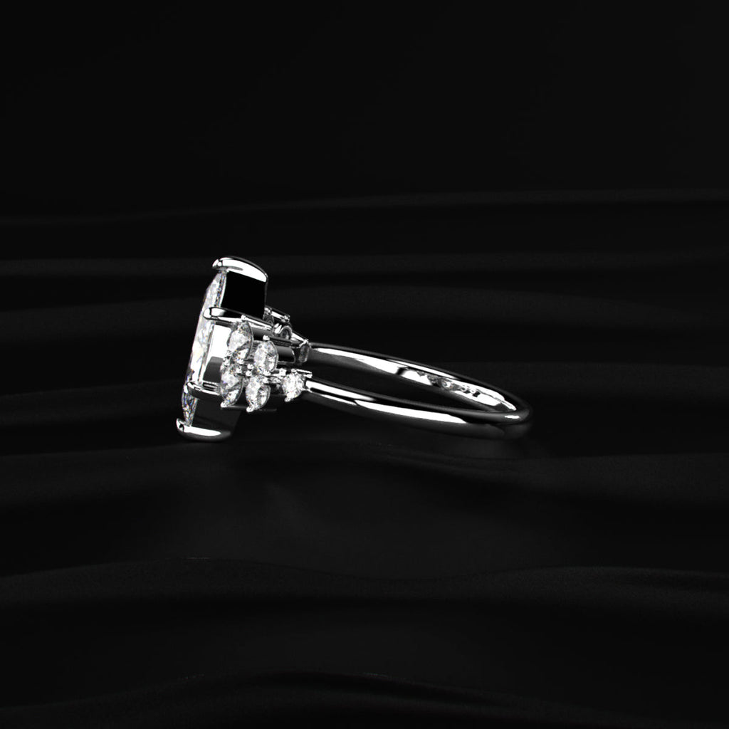 Marquise Solitaire With Cluster Diamond Ring