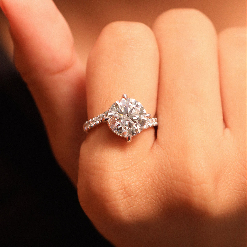 Round Diamond Solitaire Ring With Pave Band