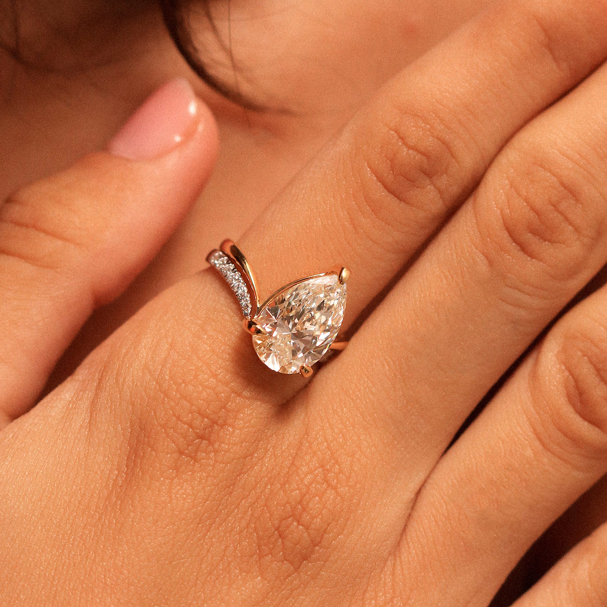 Pear Shaped Diamond Fluid Ring With Stack Band