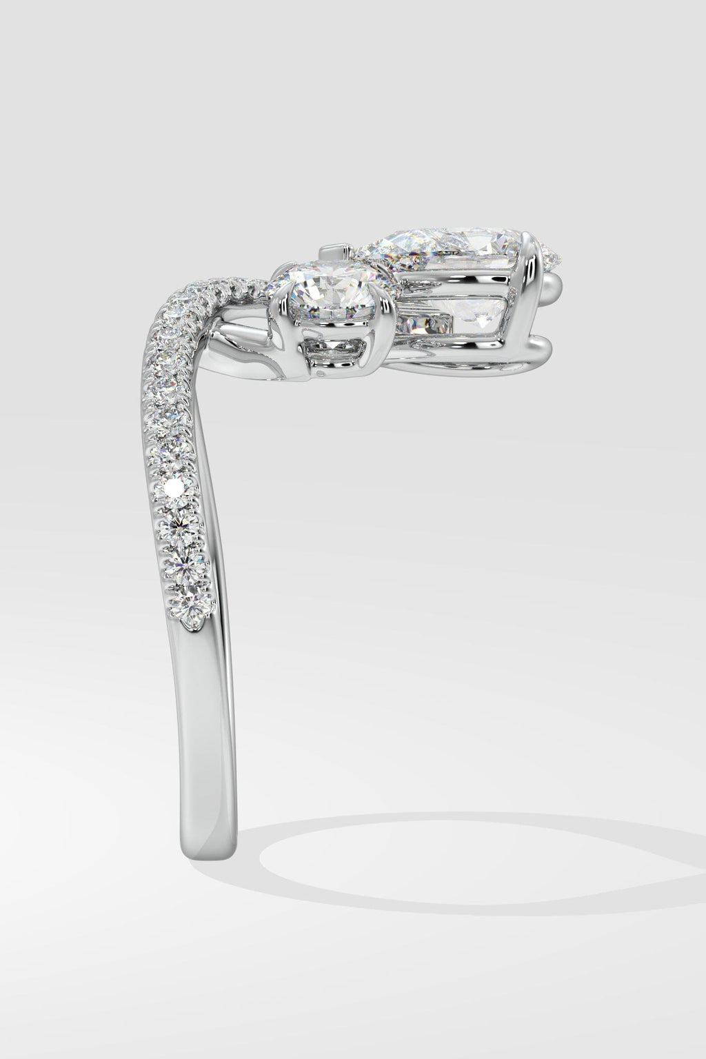 Two Stone Pear & Round Ring