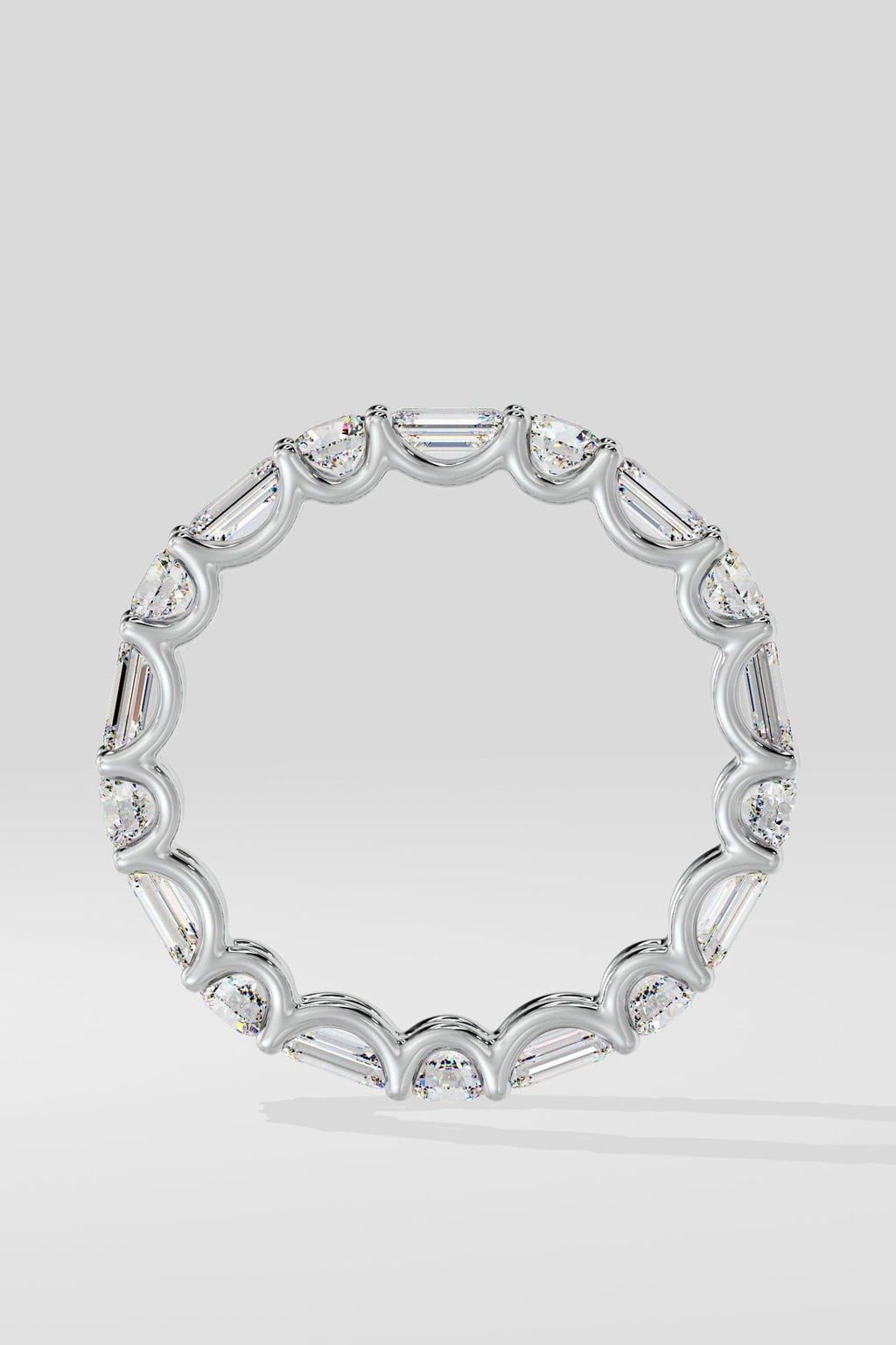 Round & Emerald Eternity Band