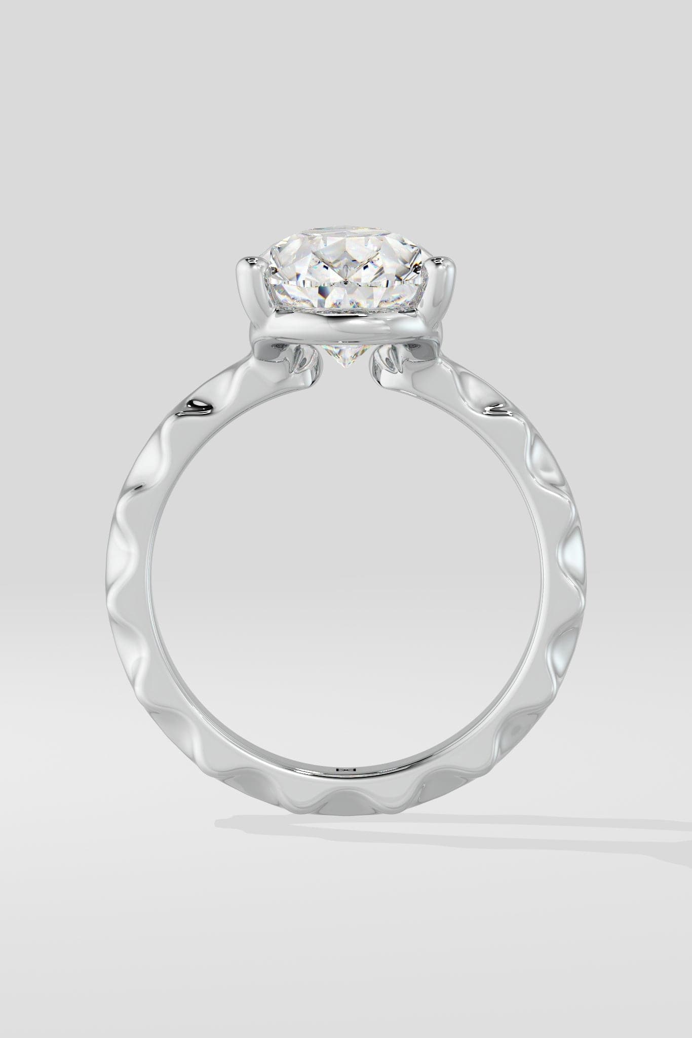 3 ct Pear Inegale Ring