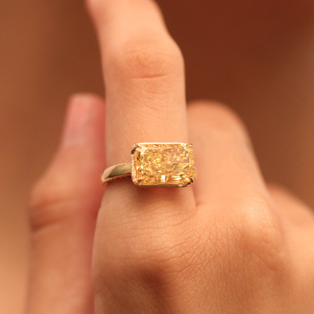 East West Radiant Yellow Diamond Solitaire Ring